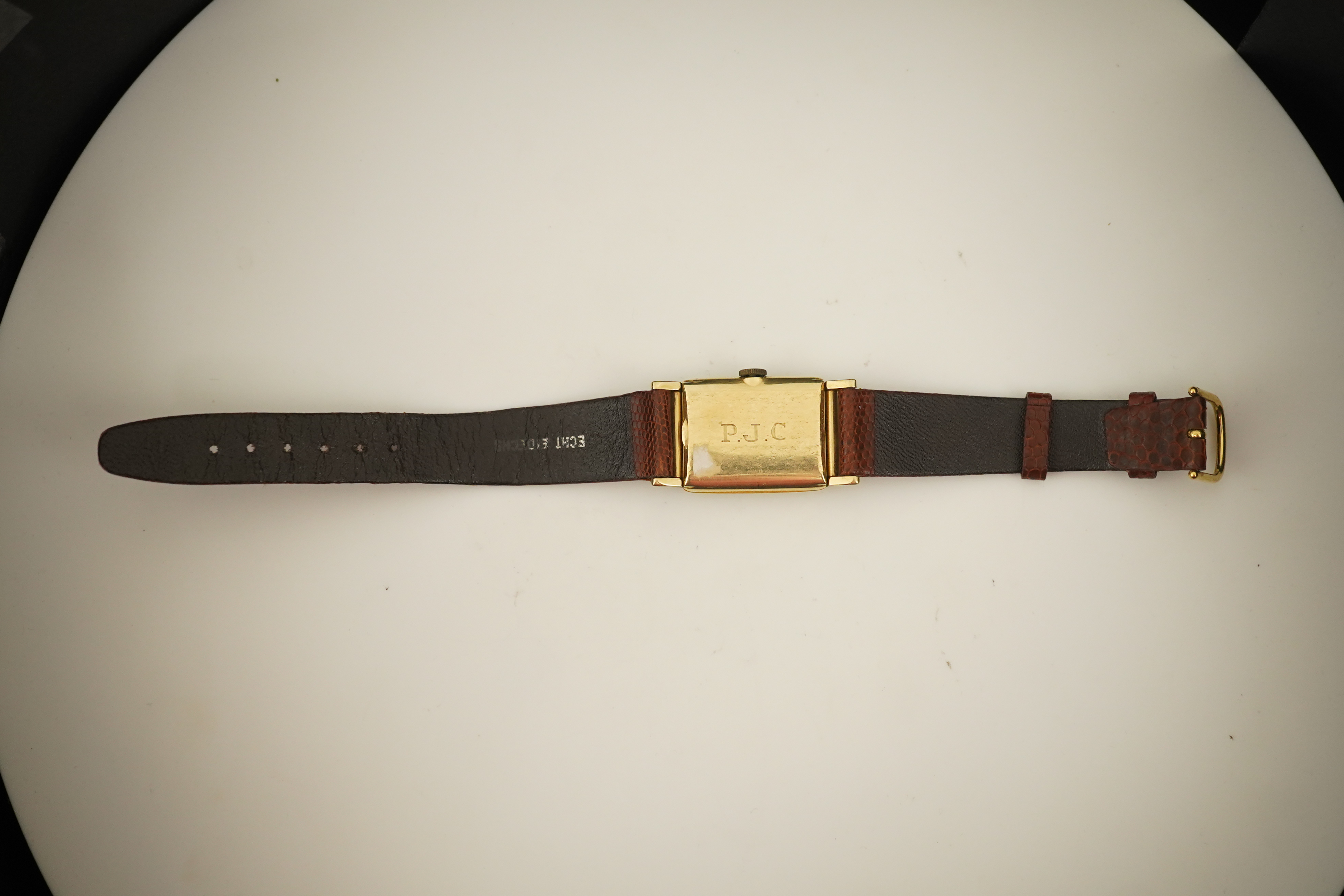 A gentleman's 1950's? 14k gold Hamilton manual wind wrist watch, on a later associated leather strap